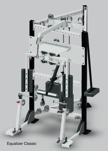 A multi-functional gym machine designed for strength training, featuring adjustable weights, pulleys, and various exercise stations.